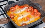 рецепт Как вкусно приготовить пикшу с помидорами